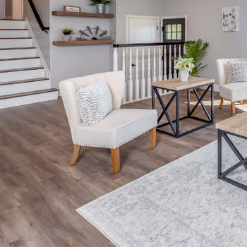 Farmhouse living room with luxury vinyl floors and decor