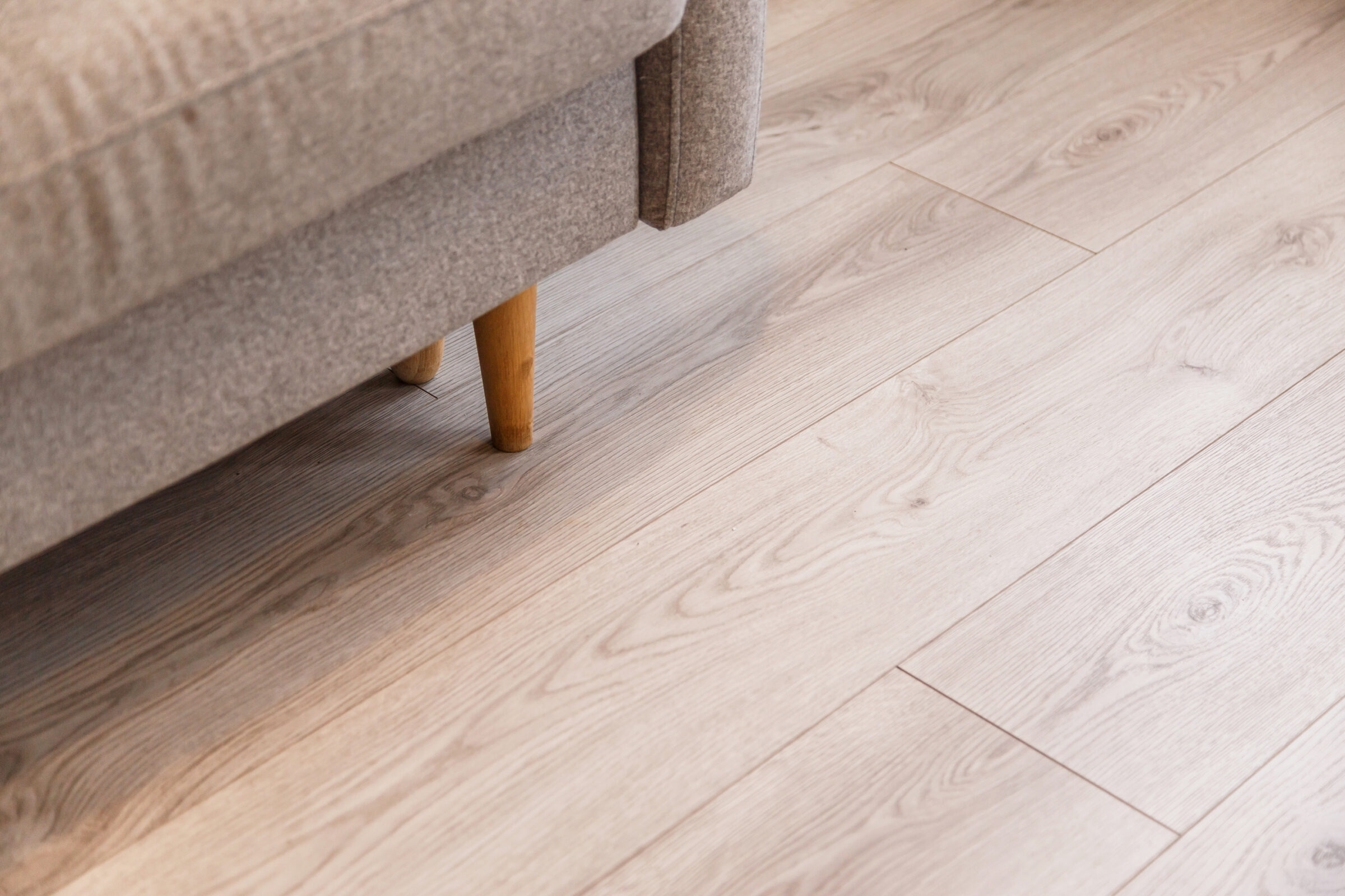 grey sofa on luxury vinyl floor